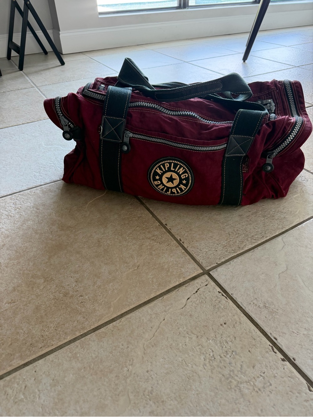 Kipling large duffel bag- Garnet burgundy color